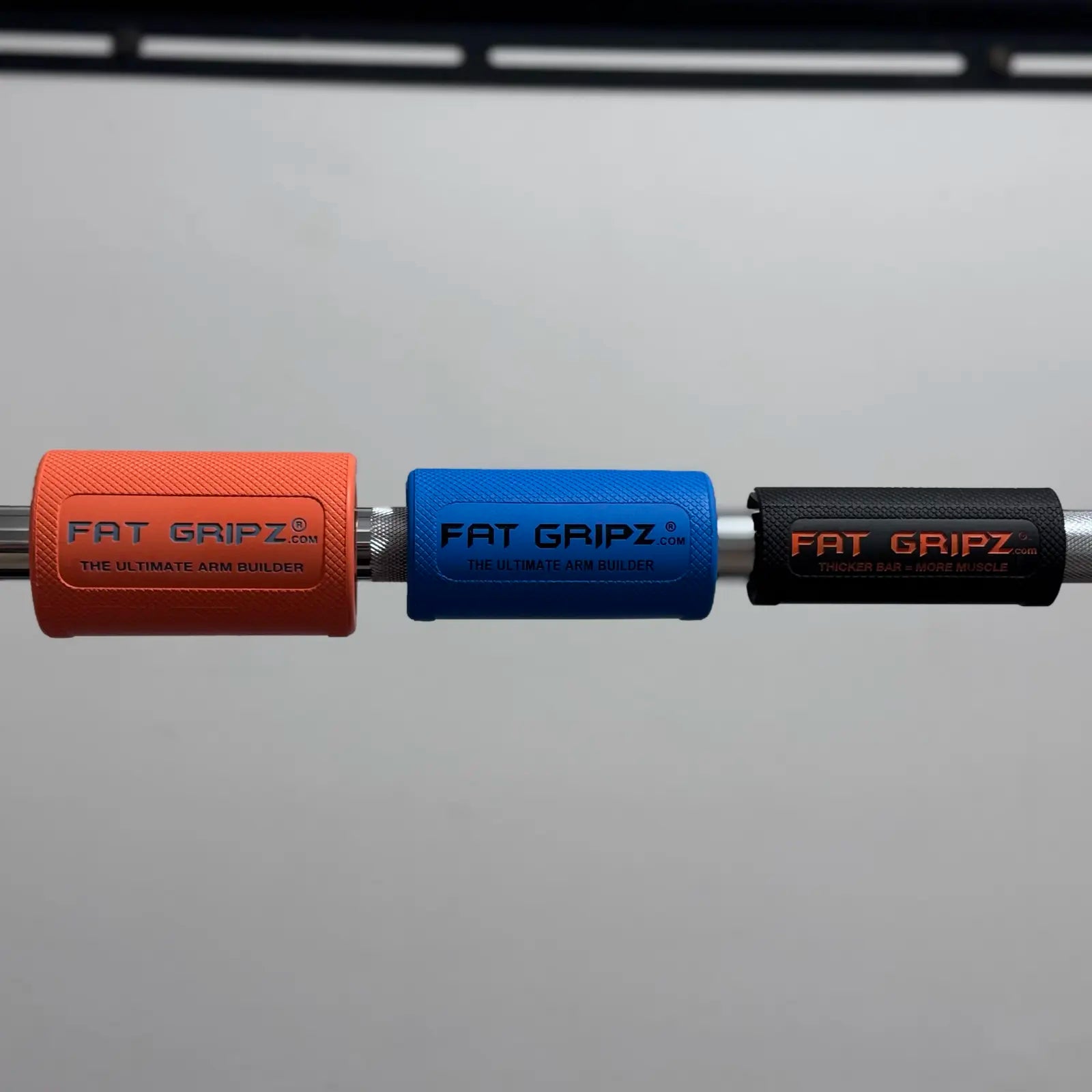 Extreme Series, Pro Series, and One Series Grips by Fat Gripz - Thick Bar Training For Grip Strength and Arm Muscle