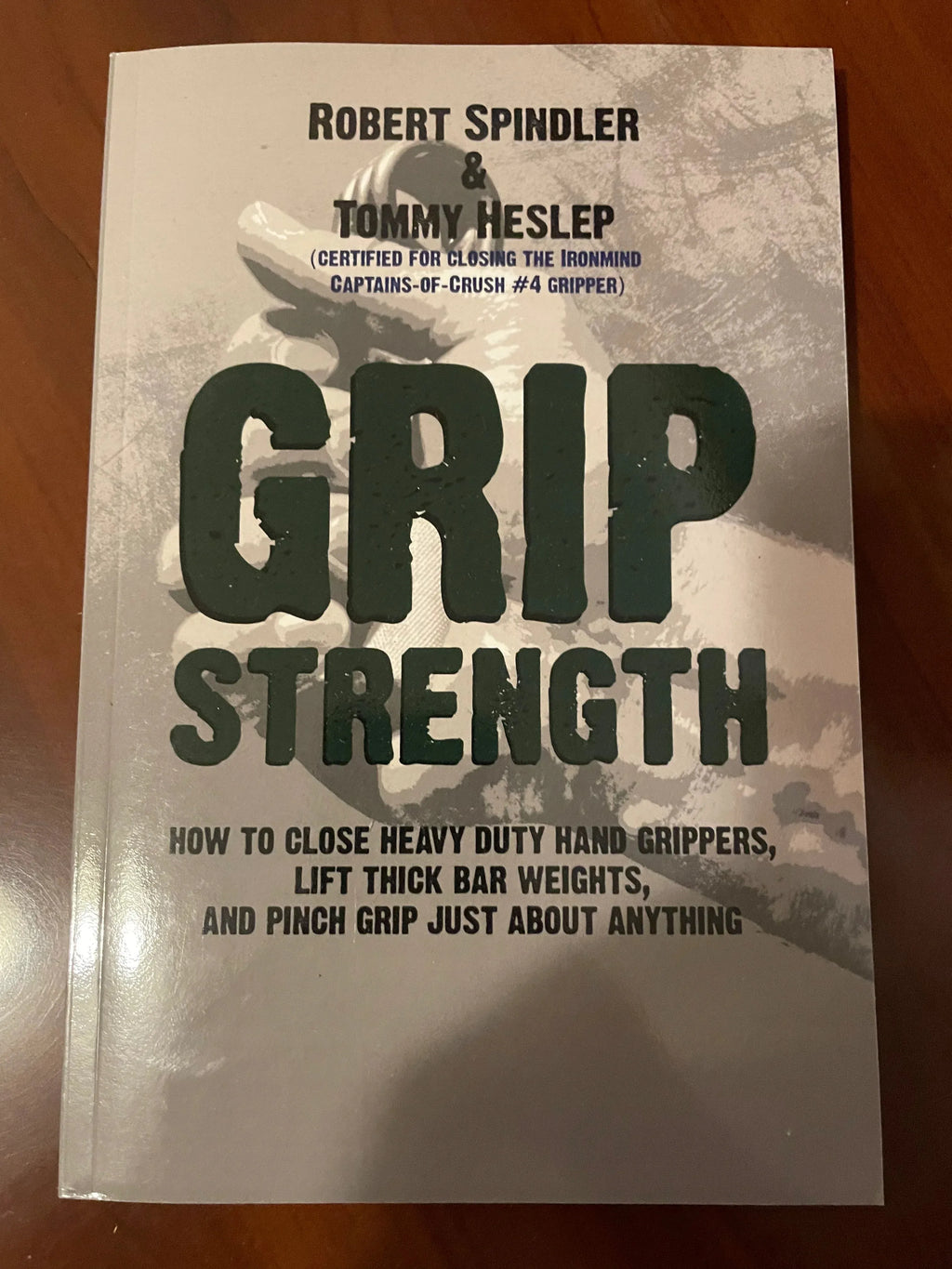Grip Strength: How to close heavy duty hand grippers, lift thick bar weights, and pinch grip just about anything, by Robert Spindler & Tommy Heslep (certified for closing the Ironmind Captains-Of-Crush #4 gripper).